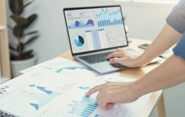 businesspeople-working-finance-accounting-analyze-financial-graph-budget-planning-future-office-room 4